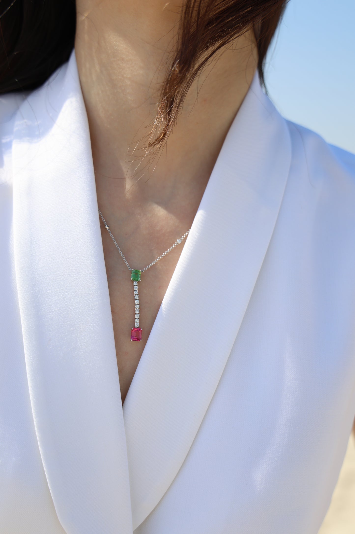 Green tourmaline and rubellite diamond pendant in 18k white gold