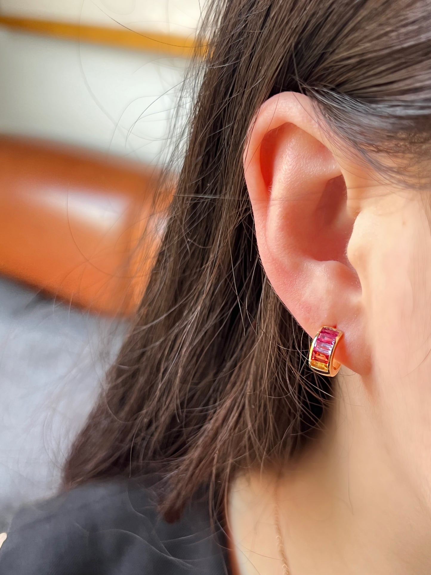 Fancy color sapphire baguette earring in 18k yellow gold