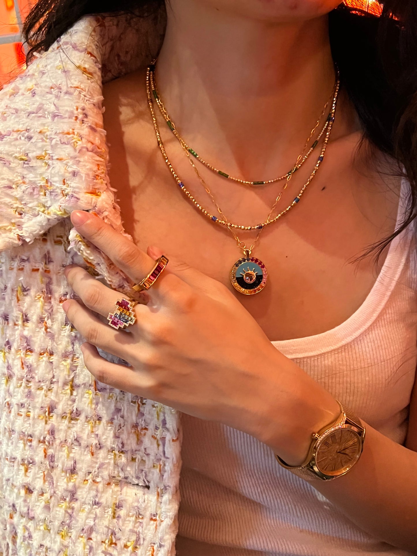 Fancy color sapphire baguette ring in 18k yellow gold