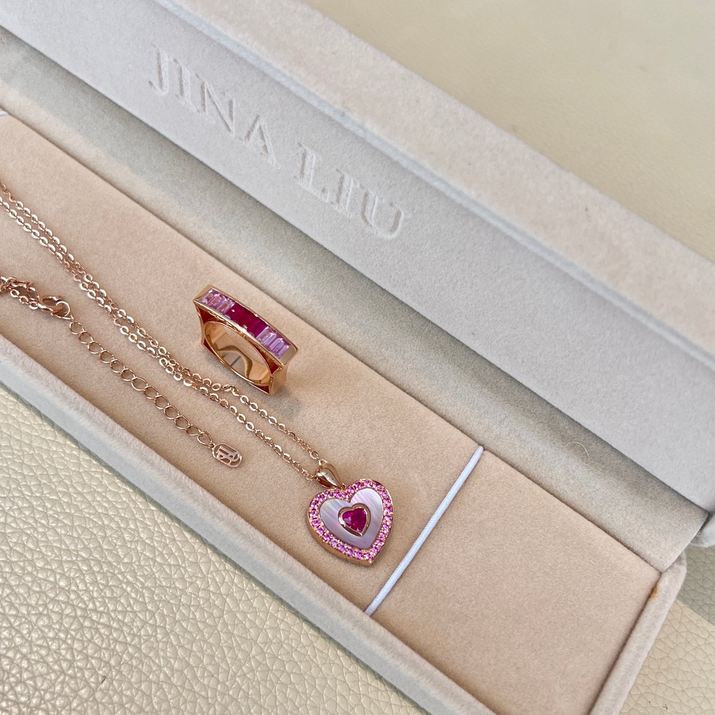 Ruby heart necklace in 18k rose gold with mother of pearl and pink sapphire