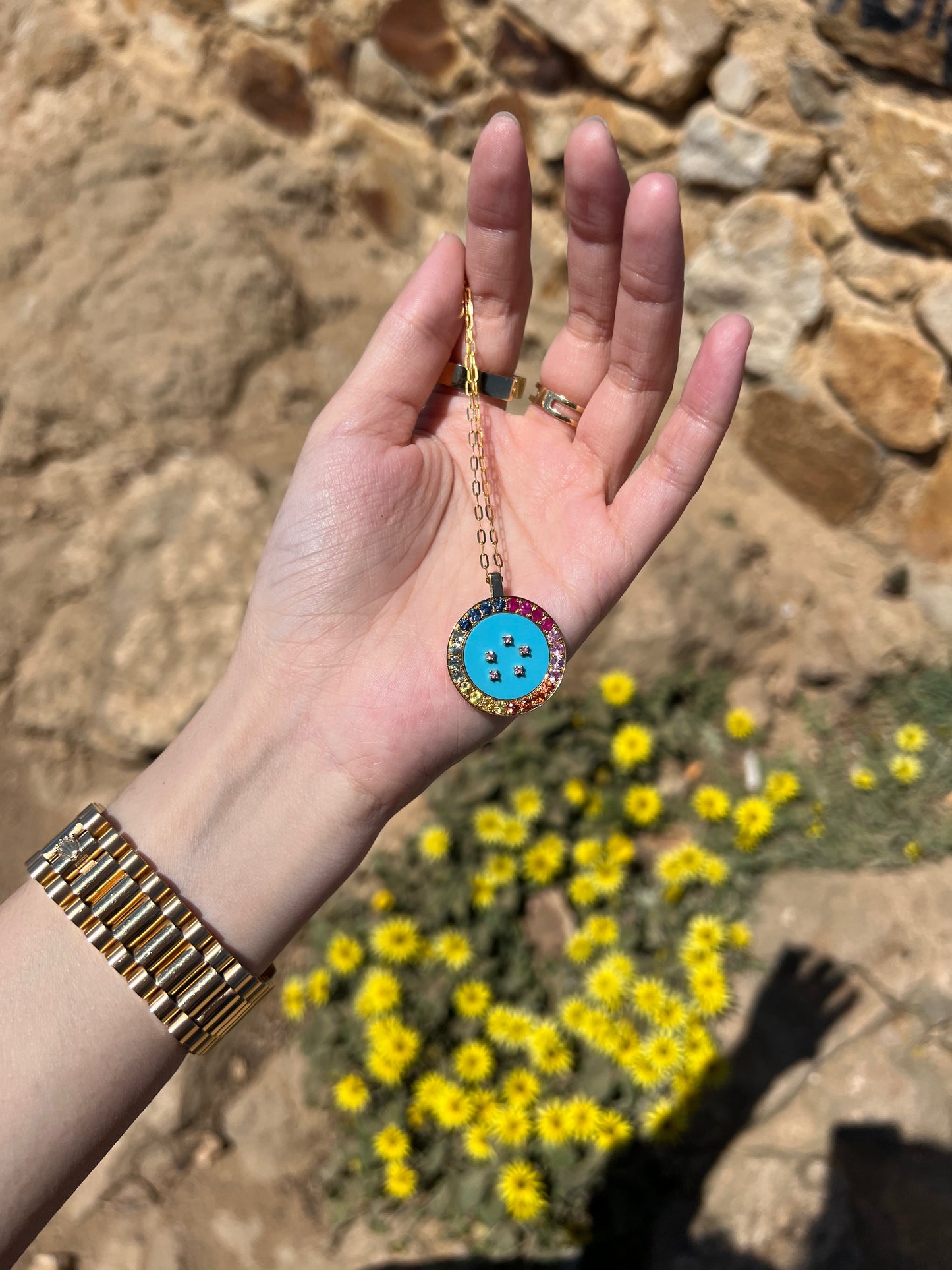 Turquoise pendant in 18k yellow gold with color sapphires