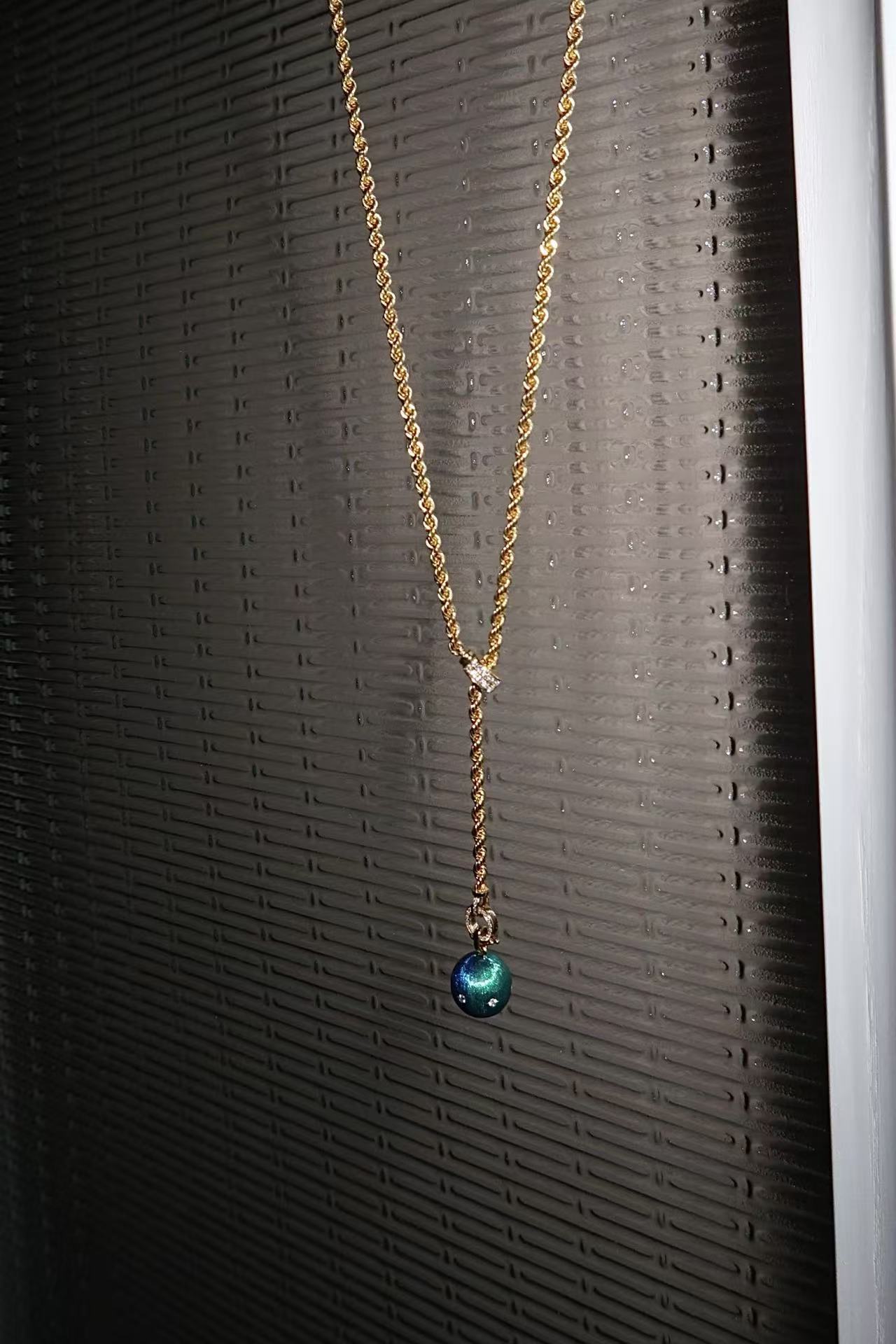 Celestial 'day n night' ball pendant in 18k gold with diamonds