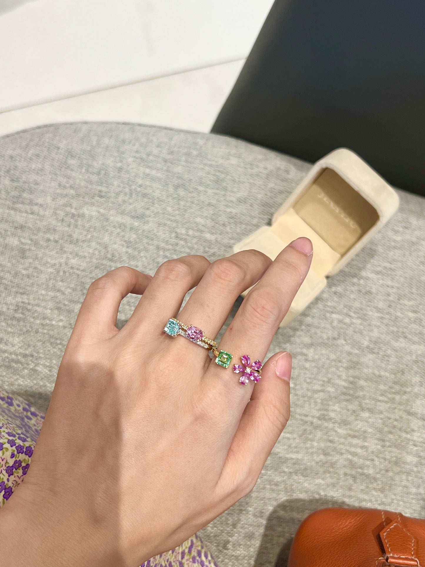 Bluish green tourmaline and pink sapphire flower ring in 18k yellow gold