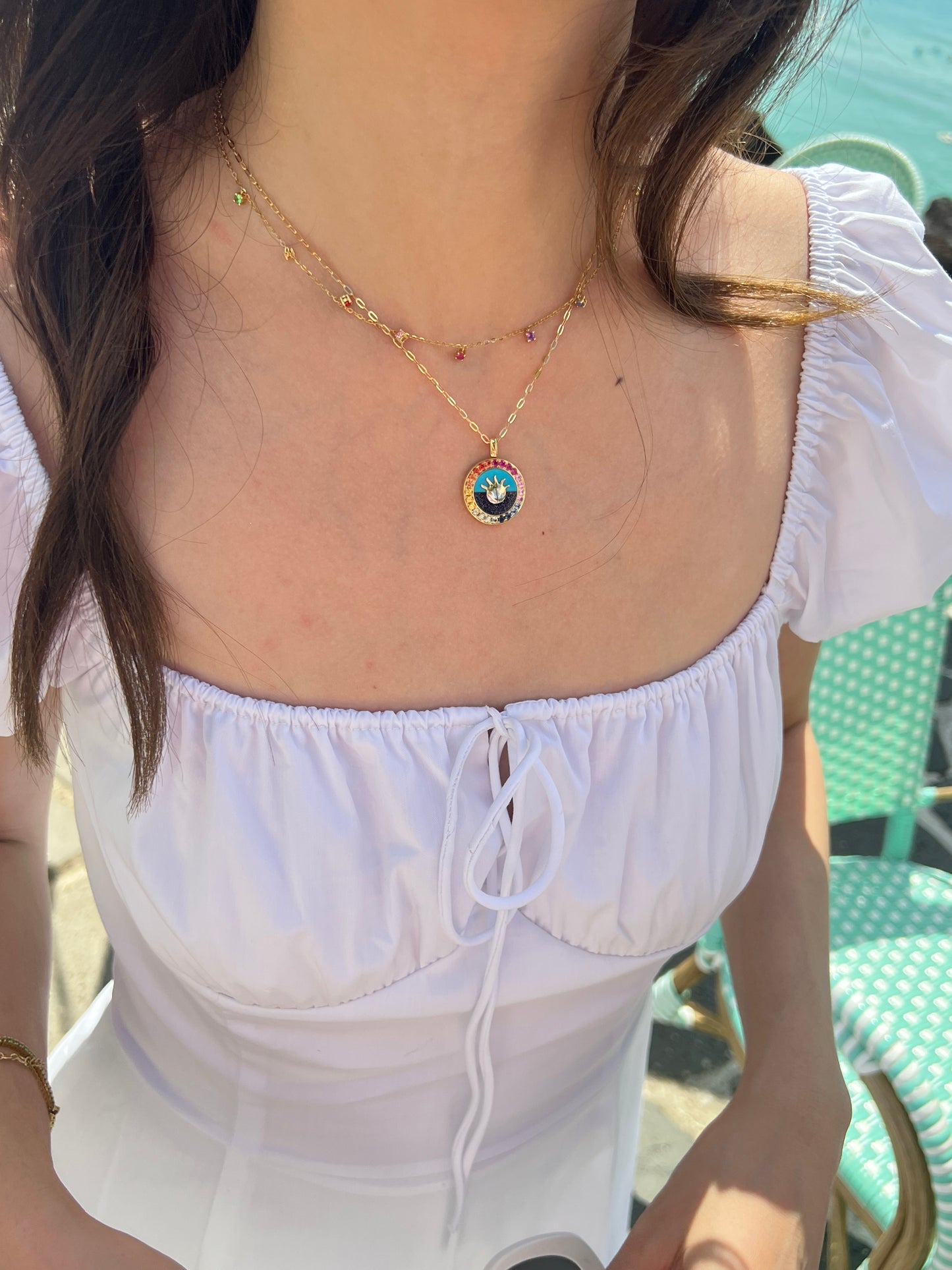 Turquoise pendant in 18k yellow gold with color sapphires