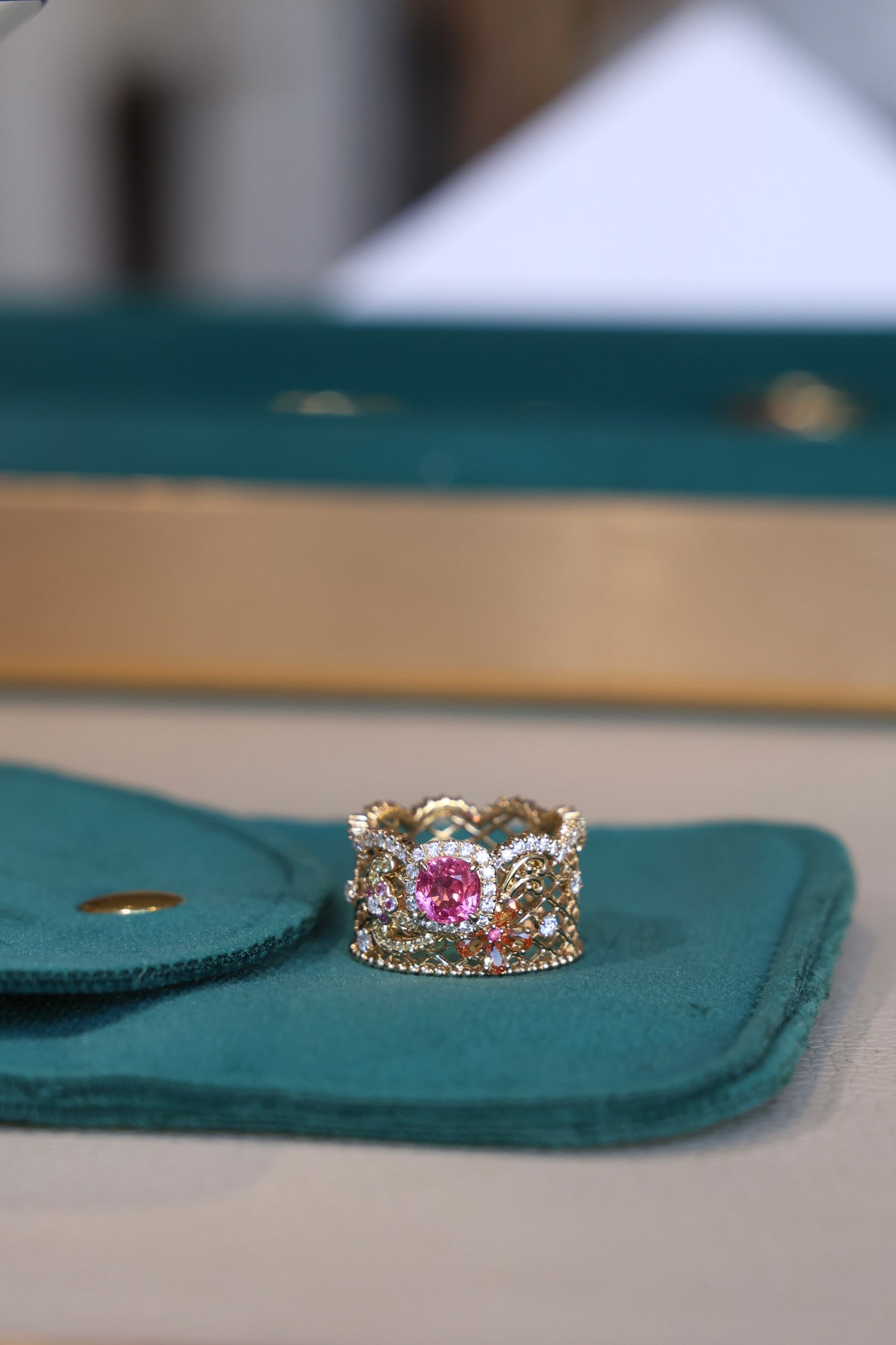 Delicate floral lace ring in 18k yellow gold with hot pink spinel and color sapphires