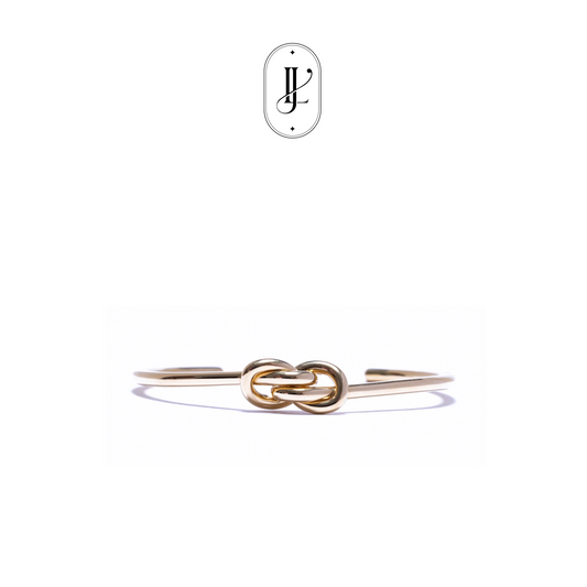 Ingot gold knot bangle in 18k yellow gold