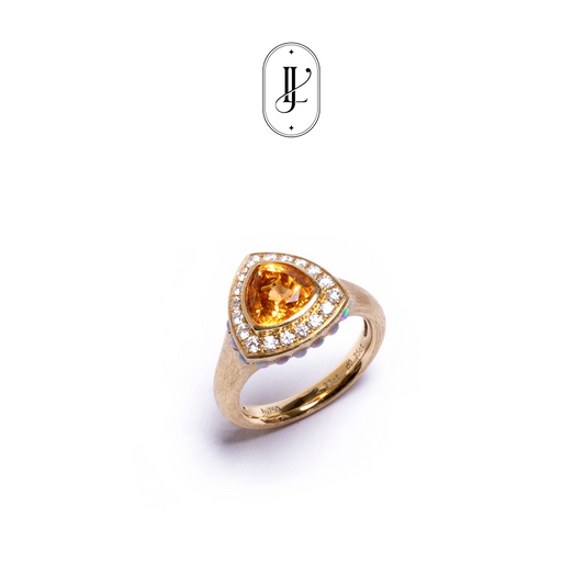 Trillion cut spessartine ring in 18k yellow gold with opal and diamond