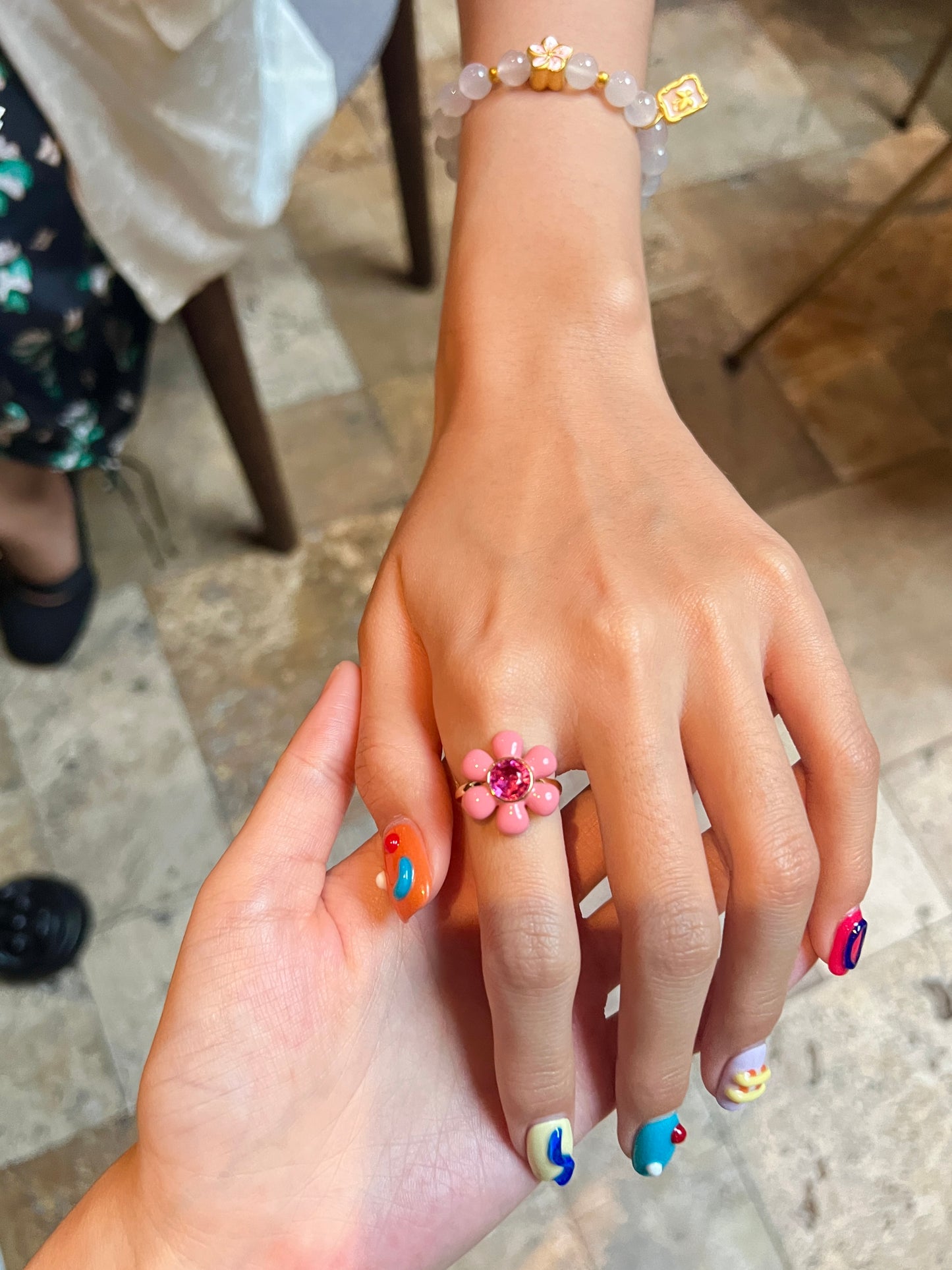 Flower shape enamel pink tourmaline ring in 18k gold