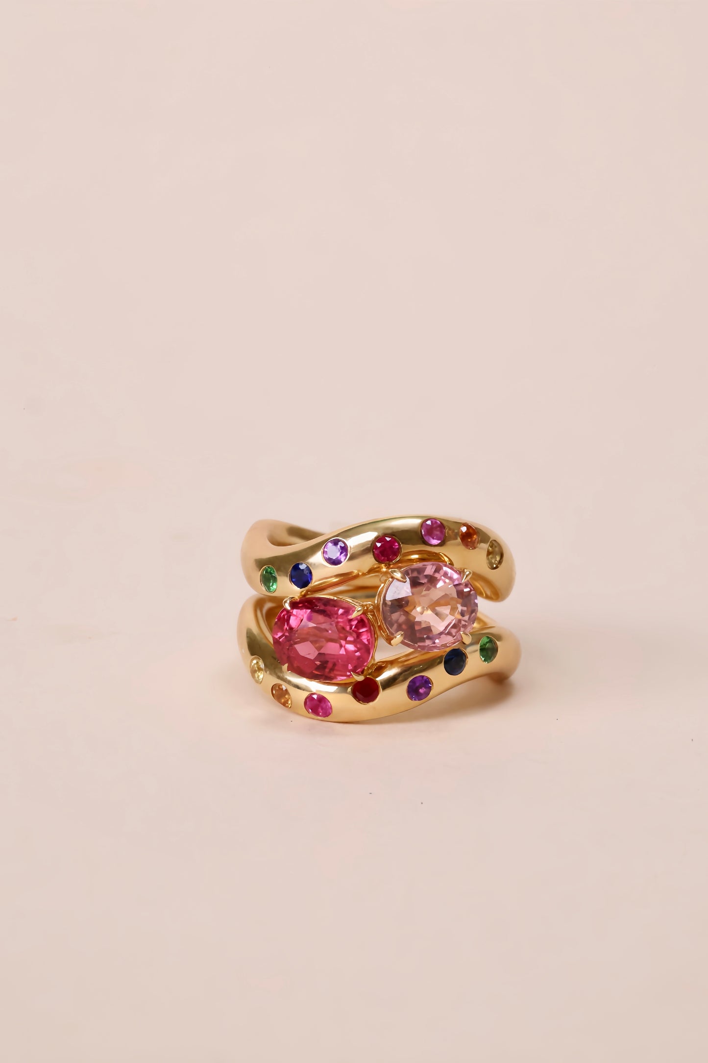 Oval pink tourmaline curve band ring in 18k yellow gold